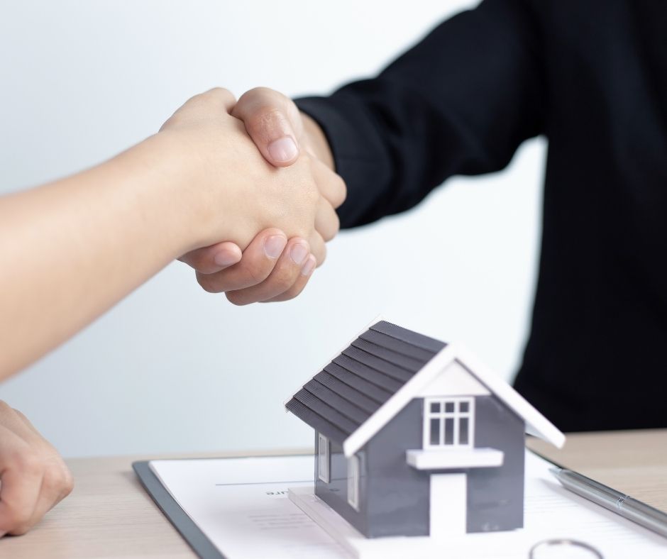 Aerial view of suburban neighborhood with homes for sale