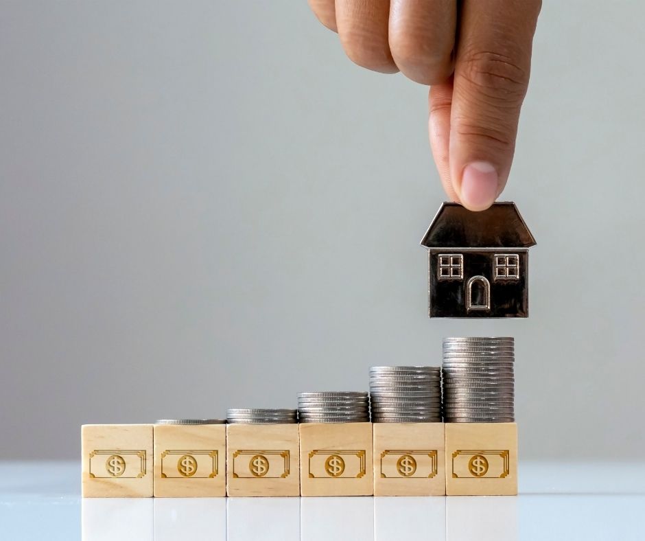 Real estate agent reviewing property listings on tablet