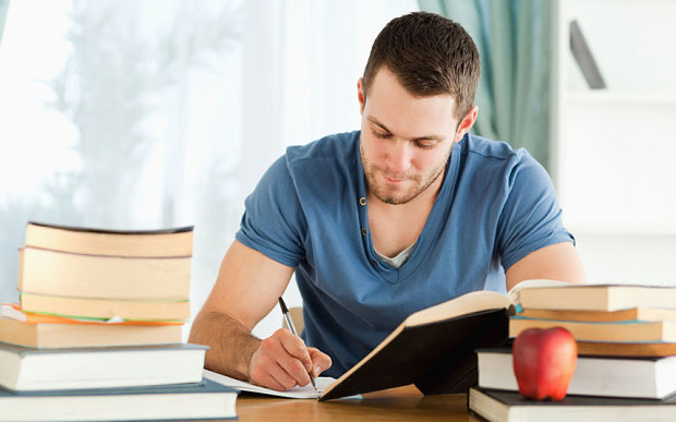 Student studying for real estate license exam