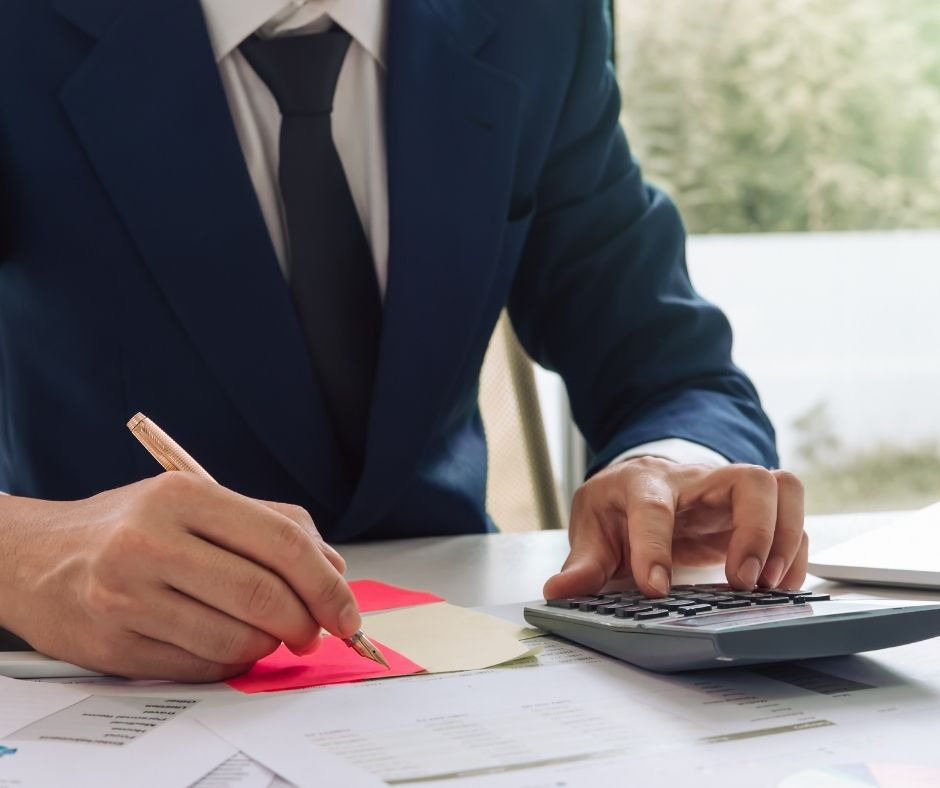Happy couple receiving keys to their new home