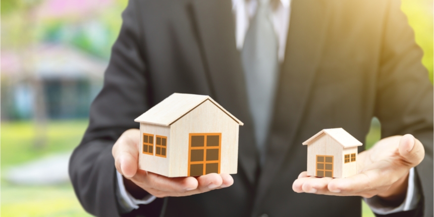 Real estate agent walking clients through a property